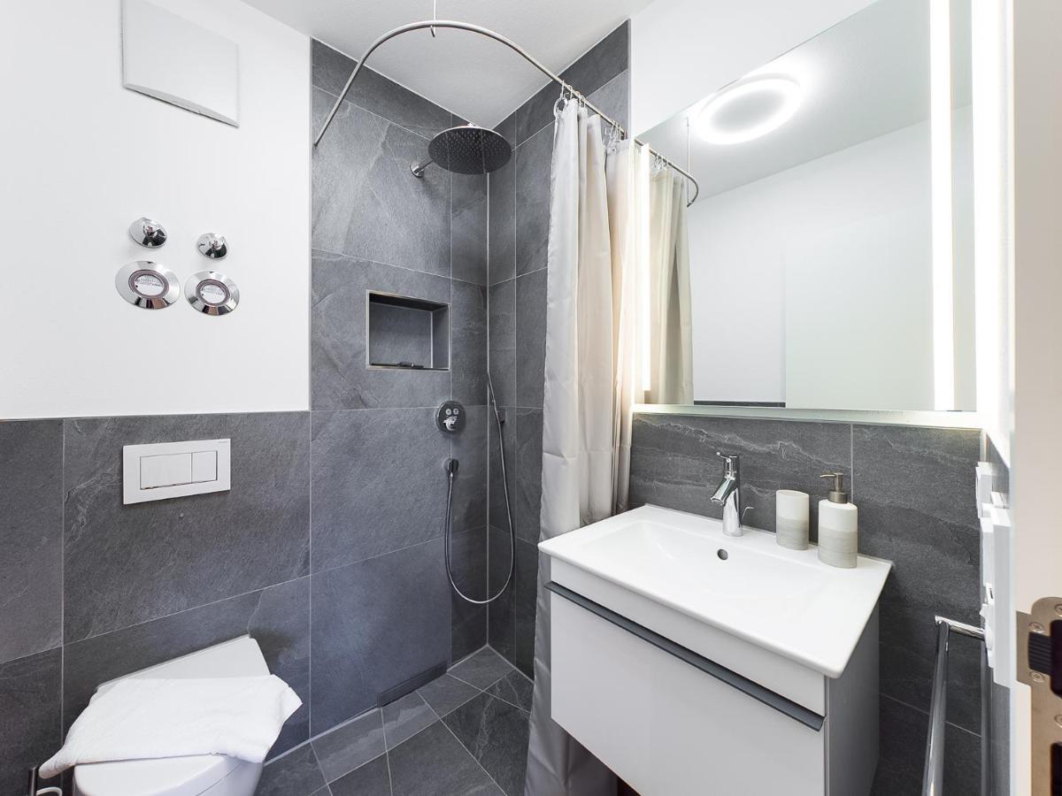 Olympia 9 Apartment การ์มิช-พาร์เทนเคียร์เชน ภายนอก รูปภาพ